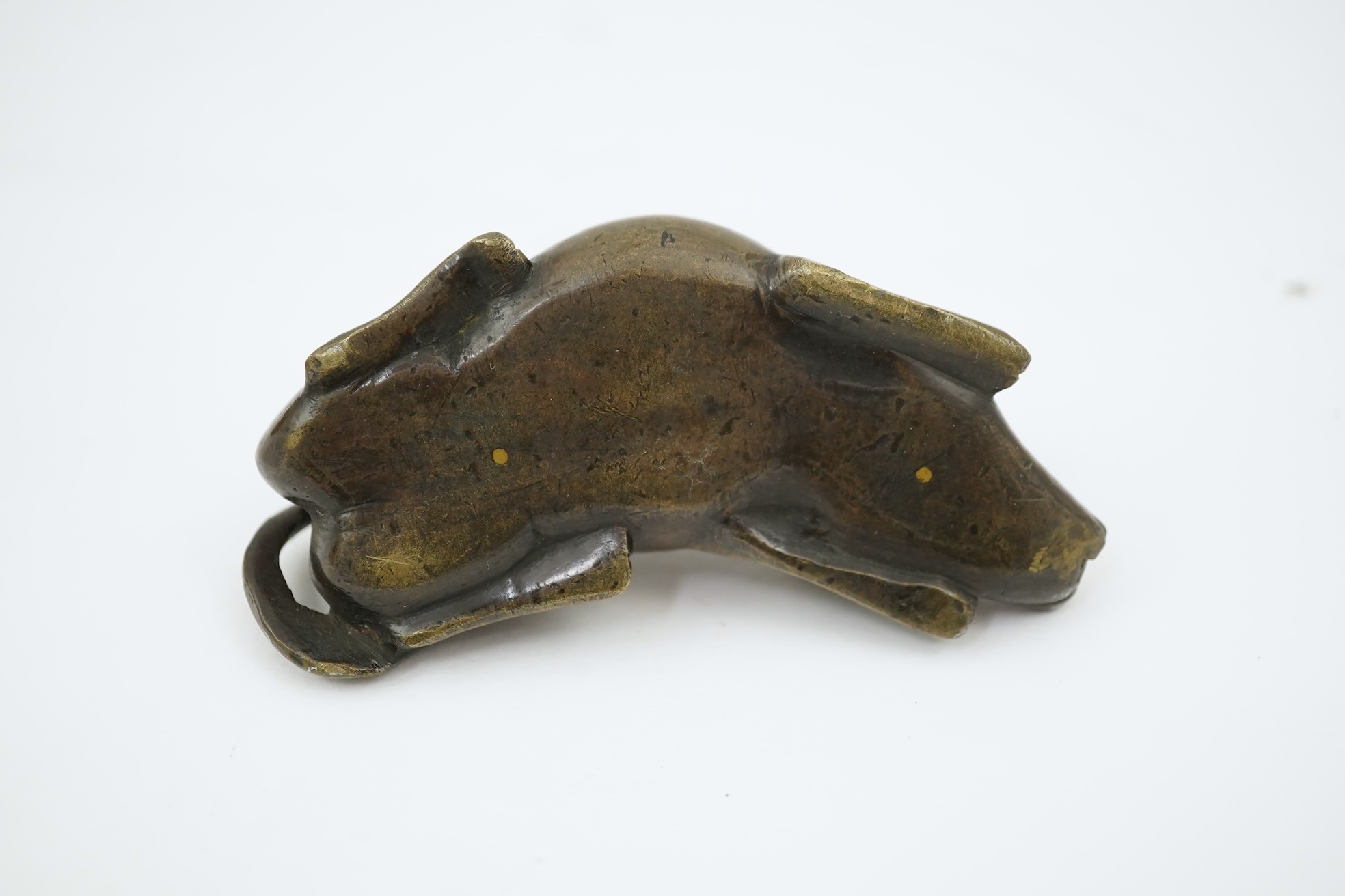 A Chinese bronze and mixed metal buffalo scroll weight, 19th century